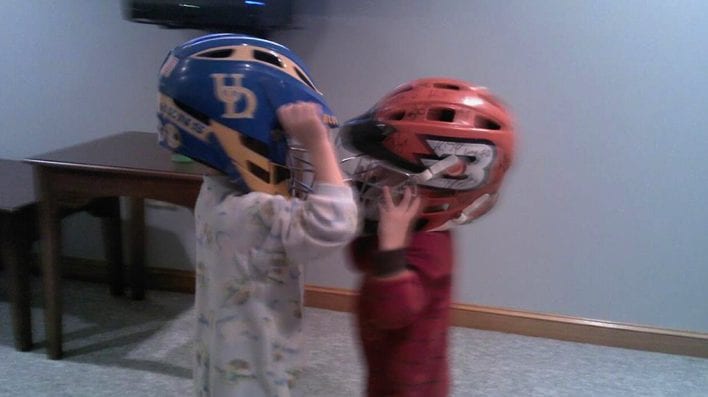 kids lacrosse helmet fight wrestle brothers