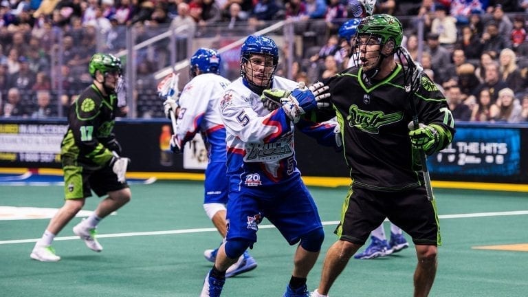 TORONTO, ON  - DEC 16,  2017: National Lacrosse League game between the Toronto Rock and the Saskatchewan Rush, Sandy Chapman battles for position against Jeff Shattler. (Photo by Ryan McCullough / NLL)